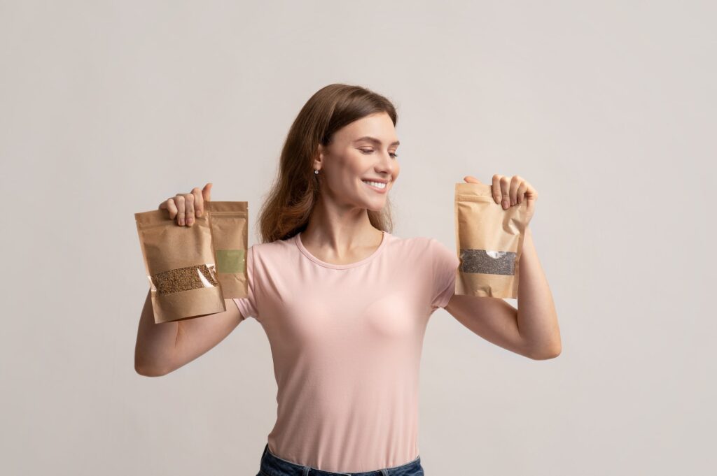 Lady with planet friendly packaging pouches