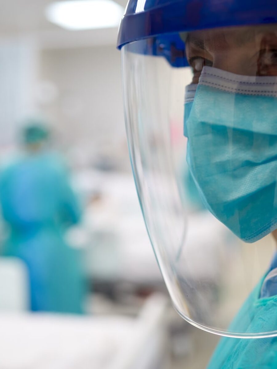 Nurse wearing face visor - environmentally friendly NHS